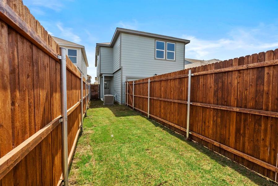Exterior details and patio area of a home in , Fort Worth (Image 3). Exterior details and patio area of a home in , Fort Worth (Image 3).