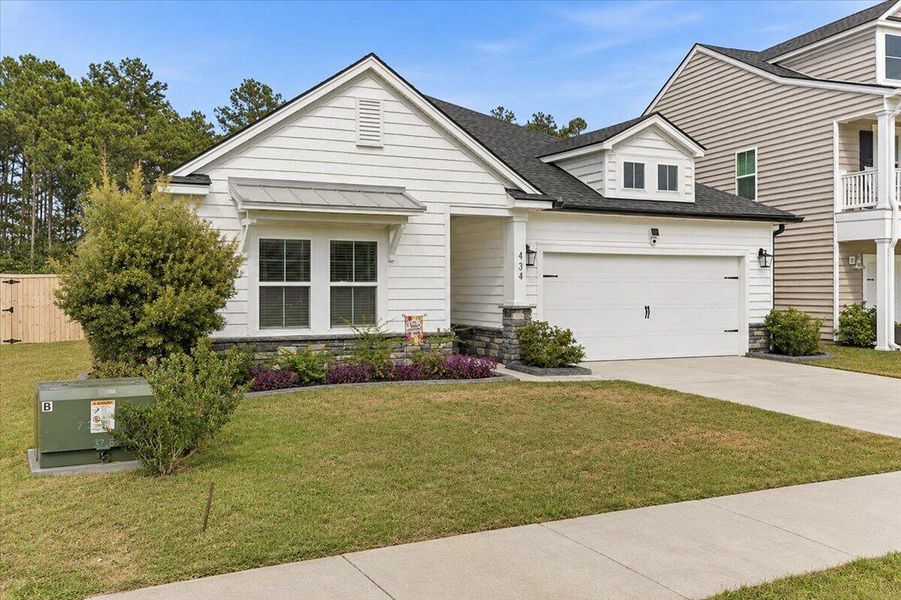 Front exterior of a new home in , Moncks Corner, SC, highlighting curb appeal (Image 2). Front exterior of a new home in , Moncks Corner, SC, highlighting curb appeal (Image 2).