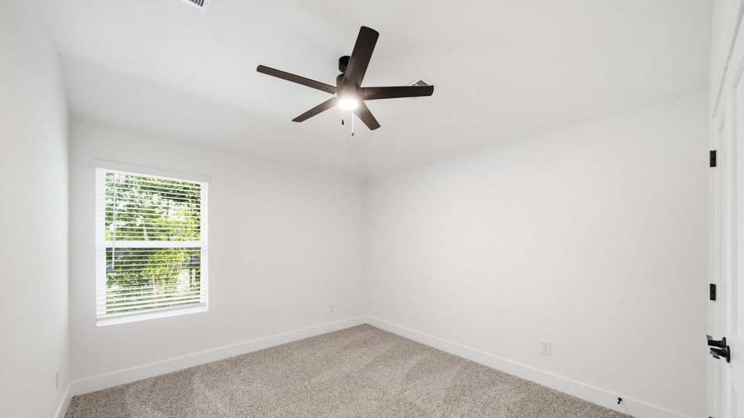 Representative unfurnished interior of a home built from the Capri by D.R. Horton in Butlers Bend Estates, Pinehurst (Image 29).
