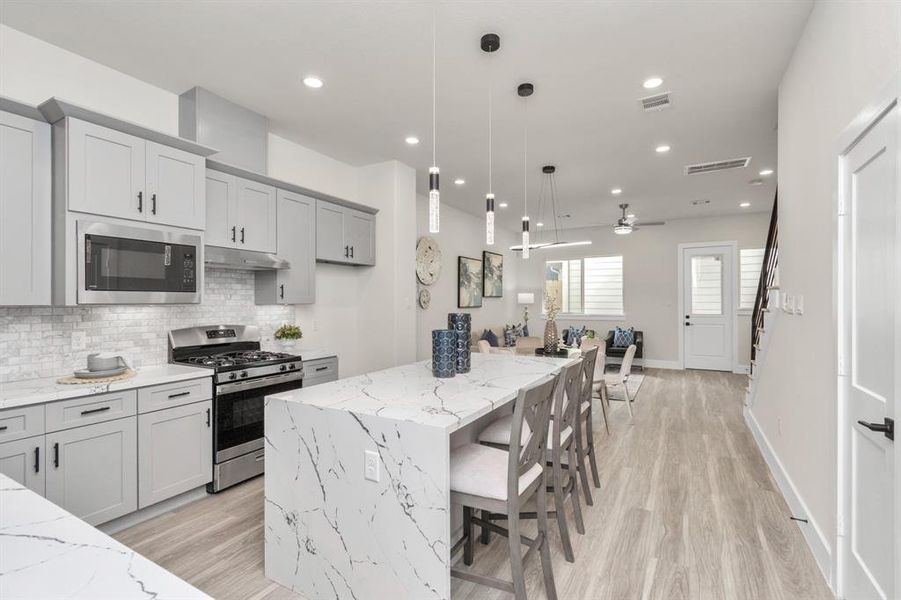 Spacious and open view from the dining area to the kitchen.