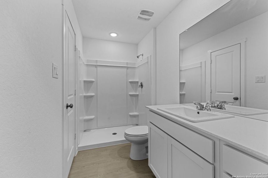 Furnished interior view inside a new home in , New Braunfels (Image 6).