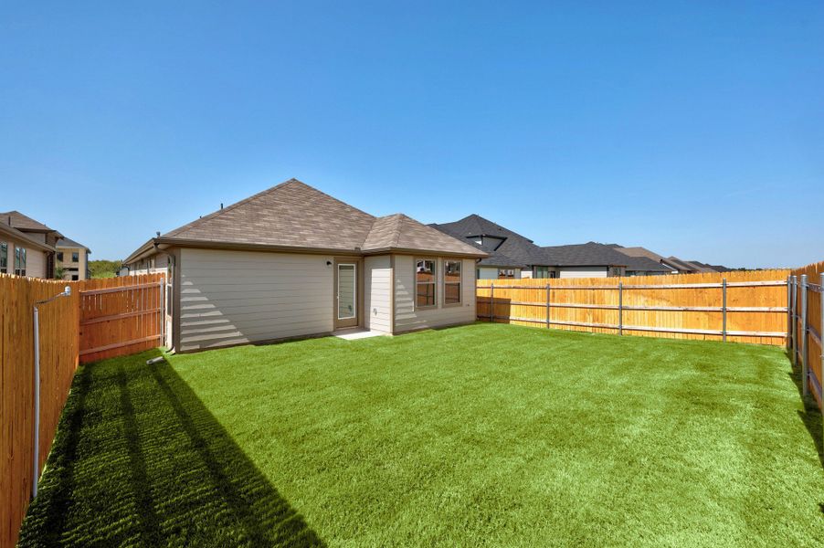 Exterior details and patio area of a home in Trinity Ranch, Elgin (Image 20).