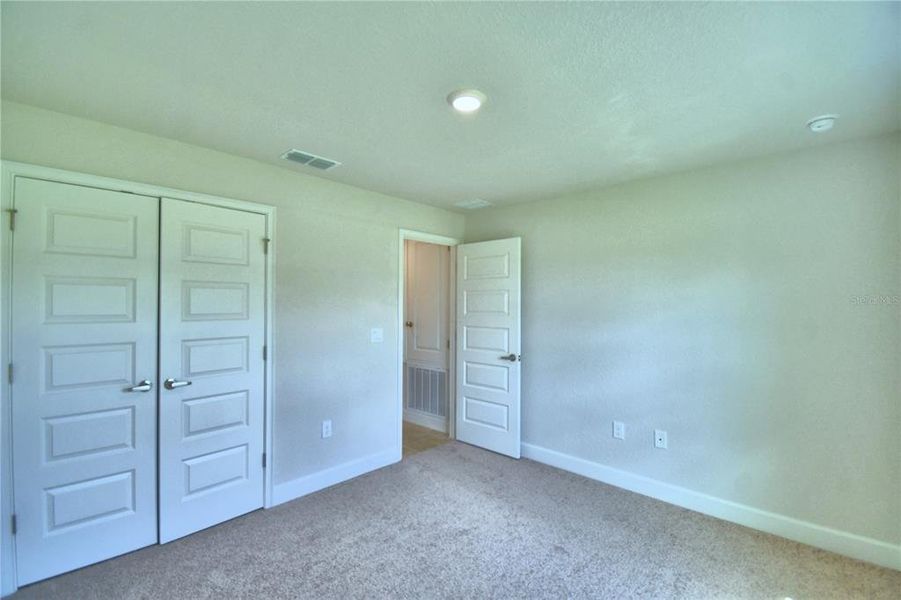 Spacious, unfurnished interior of a new home in Cadence Crossing, Auburndale (Image 24).