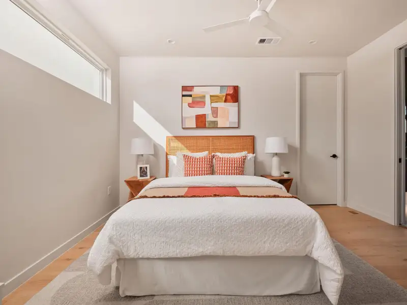 Bedroom featuring light wood finished floors and ceiling fan