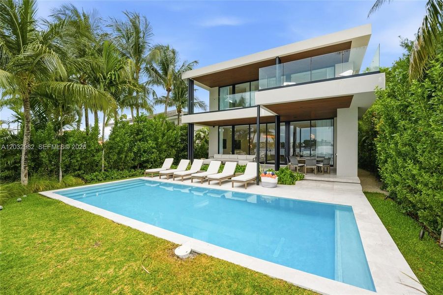 Exterior details and patio area of a home in , Miami Beach (Image 26). Exterior details and patio area of a home in , Miami Beach (Image 26).