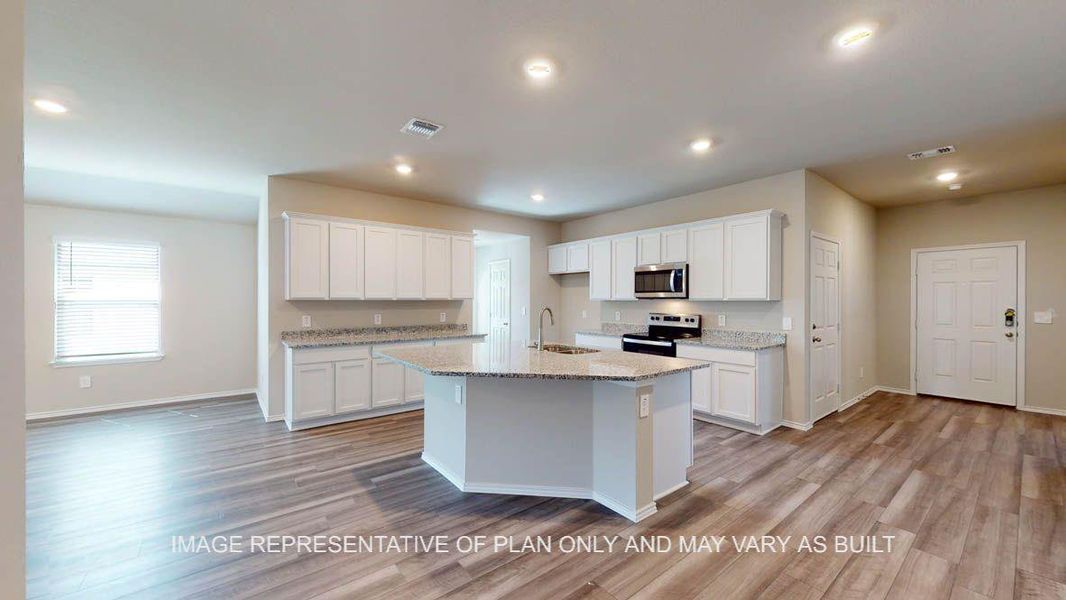 Furnished interior view inside a new home in Reserve at Mallard Lakes, Orange (Image 3).