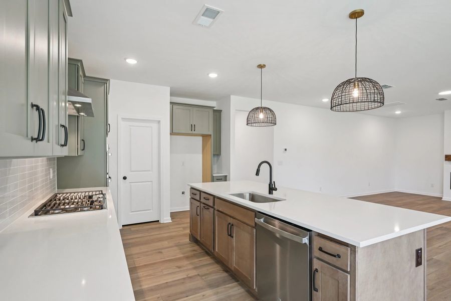 Kitchen featuring the AW Collection® Rosemary - Matte black, light wood, and garden-inspired style. Kitchen featuring the AW Collection® Rosemary - Matte black, light wood, and garden-inspired style.