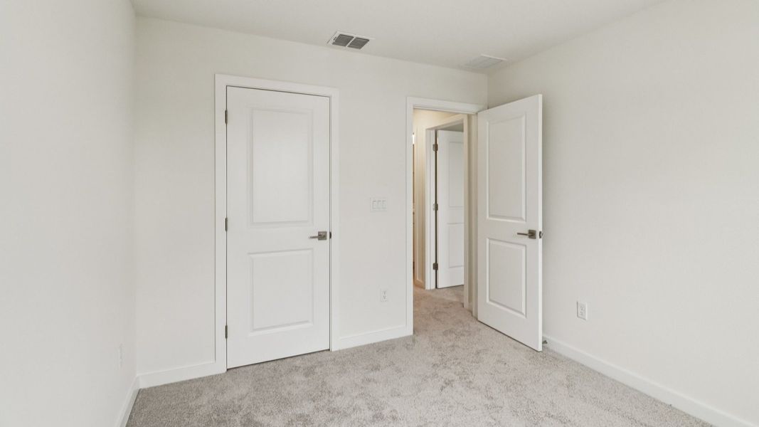 Representative furnished interior of a home built from the Carmel - Interior by DRB Homes in Cyrene at Harmony, St. Cloud (Image 27). Representative furnished interior of a home built from the Carmel - Interior by DRB Homes in Cyrene at Harmony, St. Cloud (Image 27).