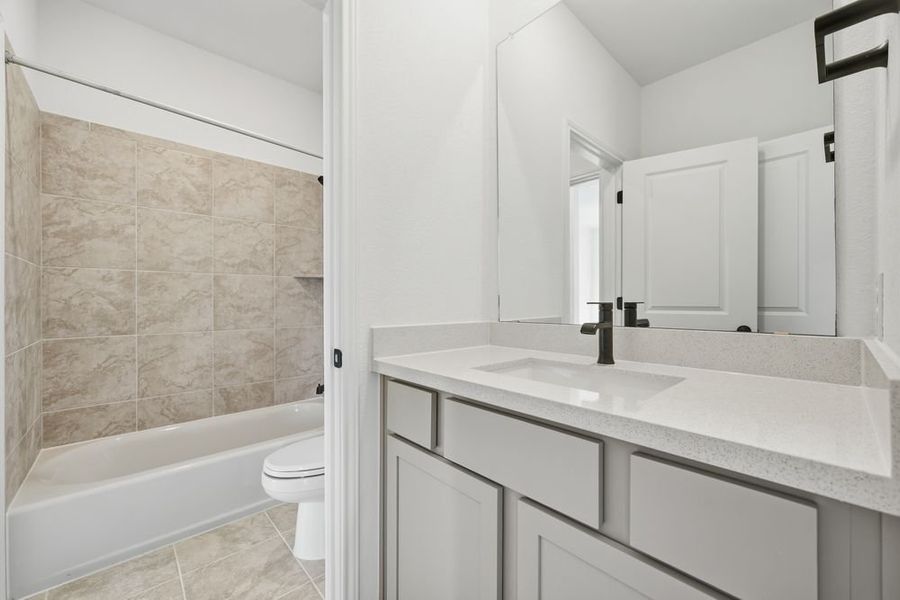 Furnished interior view inside a new home in Parkside on the River, Georgetown (Image 8).