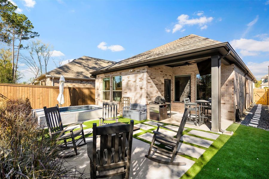 Exterior details and patio area of a home in The Highlands 40', Porter (Image 24).