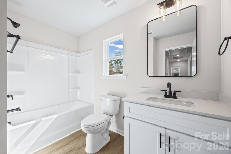 Furnished interior view inside a new home in , Belmont (Image 8).