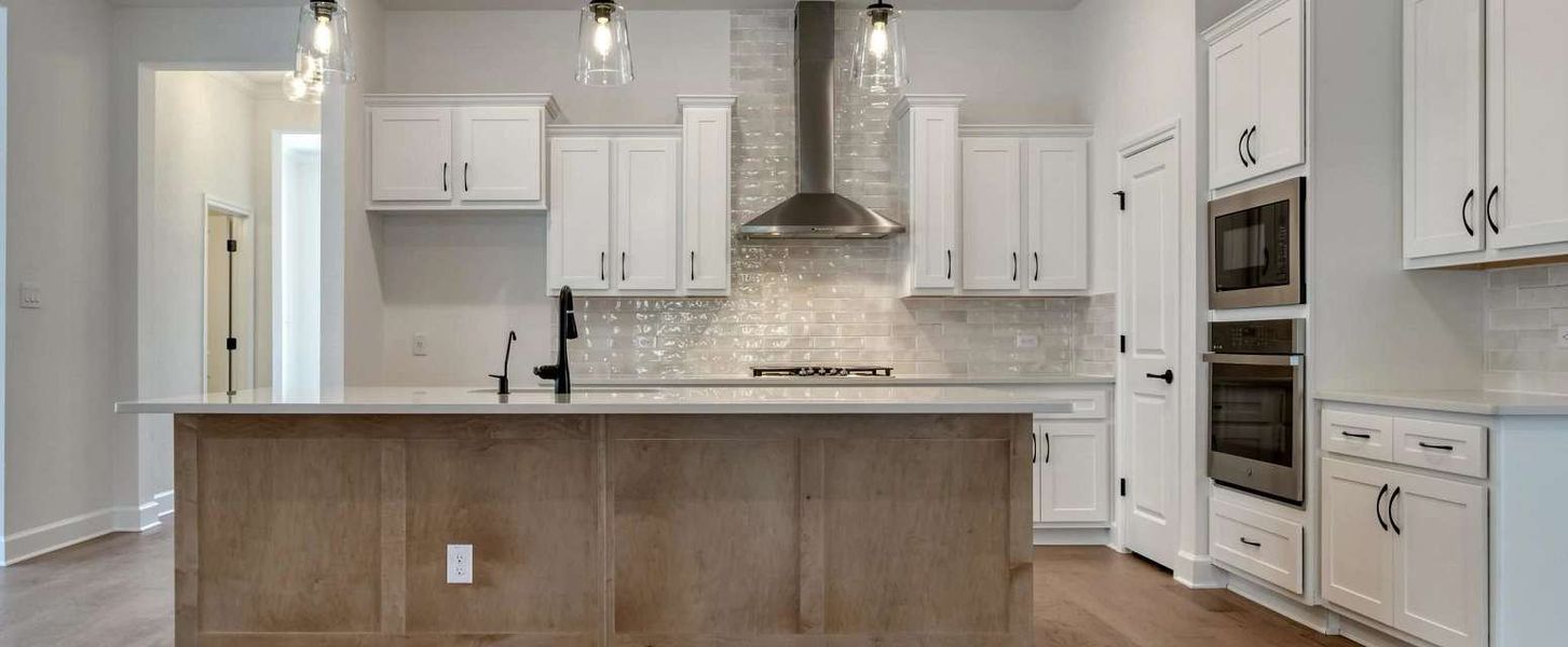 Representative furnished interior of a home built from the Alexander II by Ashton Woods in Sunday Creek at Kinder Ranch, San Antonio (Image 11).