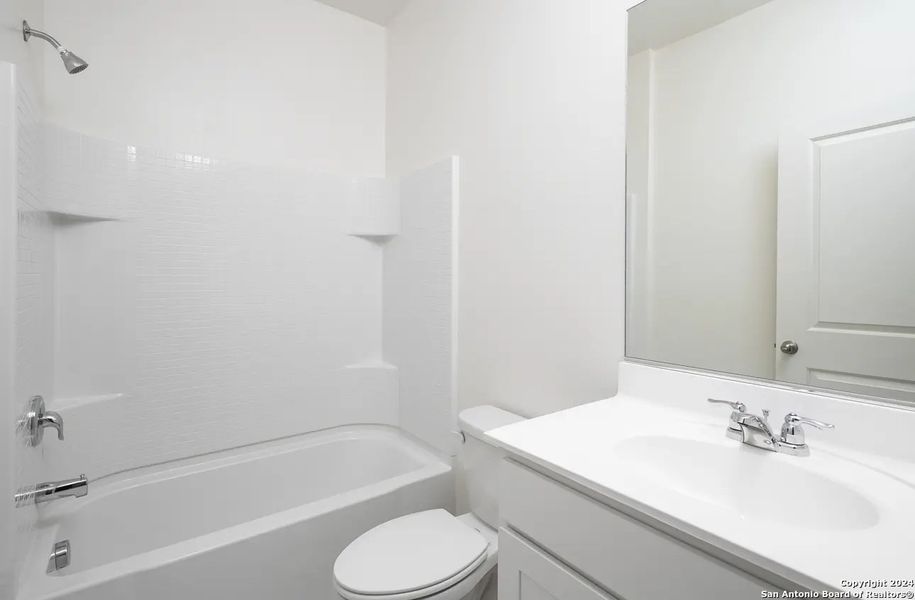 Furnished interior view inside a new home in Hennersby Hollow, San Antonio (Image 10).