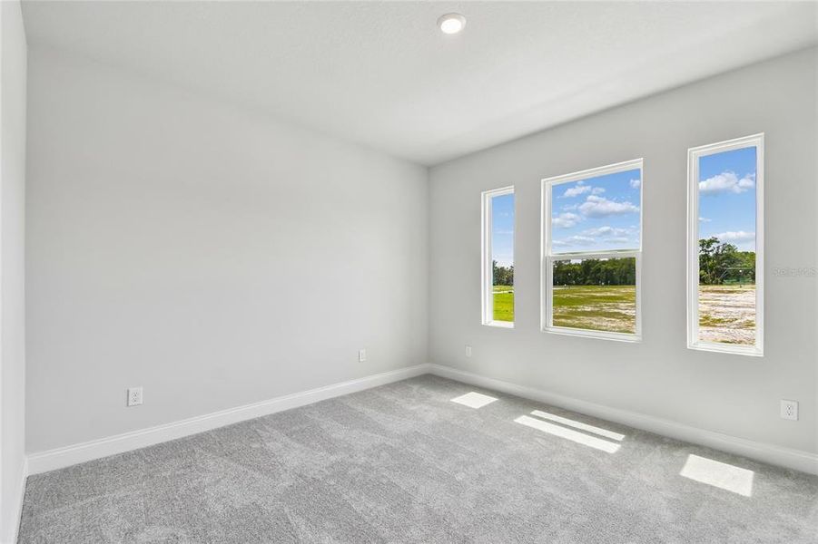 Spacious, unfurnished interior of a new home in Oakfield at Mount Dora Village Series, Mount Dora (Image 24).