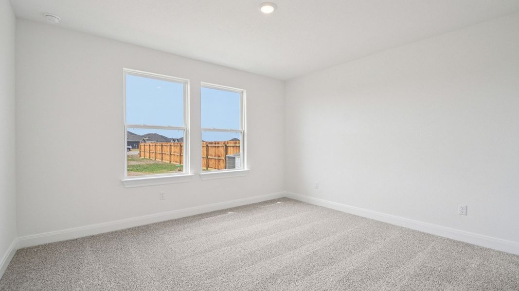 Spacious, unfurnished interior of a new home in Railhead, Cedar Creek (Image 23).