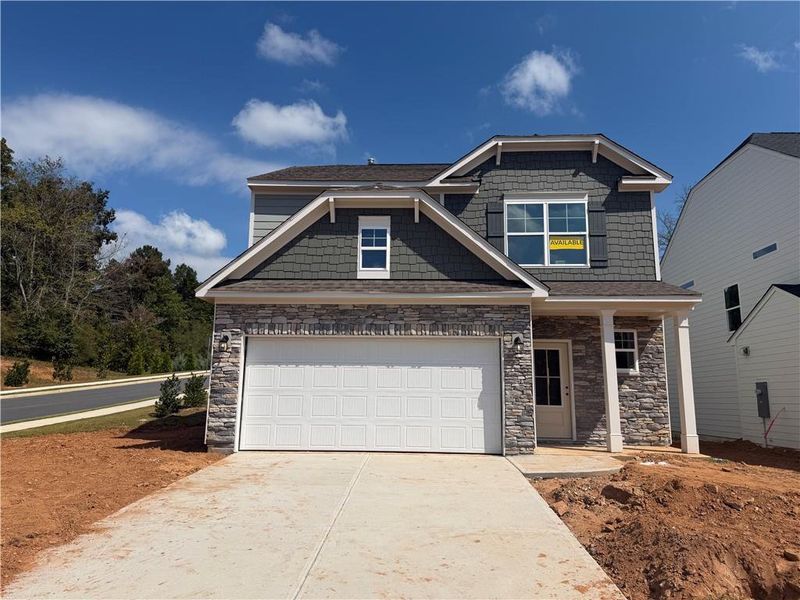 Front exterior of a new home in Villas at Dawsonville, Dawsonville, GA, highlighting curb appeal (Image 1). Front exterior of a new home in Villas at Dawsonville, Dawsonville, GA, highlighting curb appeal (Image 1).