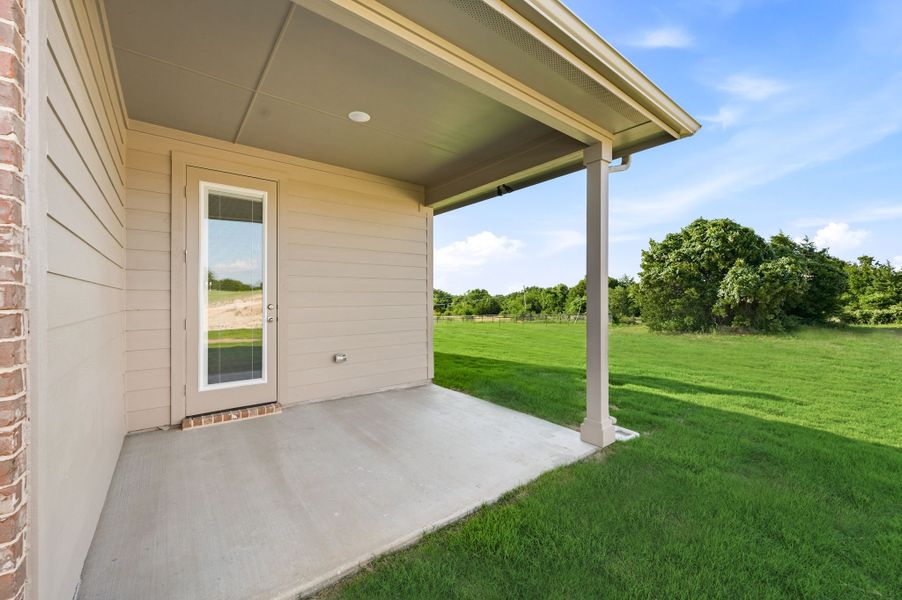 Exterior details and patio area of a home in Saddleback Estates, Boyd (Image 26).