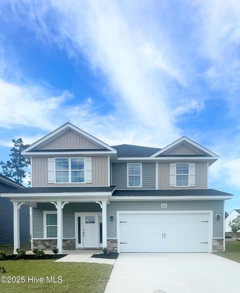Front exterior of a new home in Athens Acres, New Bern, NC, highlighting curb appeal (Image 1).