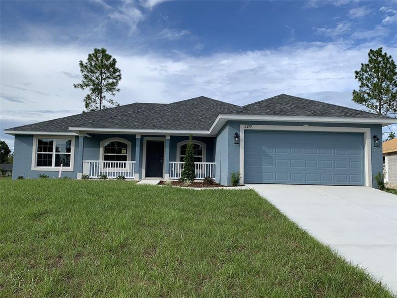 Exterior details and patio area of a home in Citrus Springs Sub, Citrus Springs (Image 2).