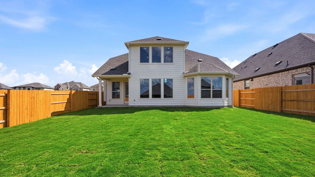 Exterior details and patio area of a home in Oaks at San Gabriel, Georgetown (Image 4).