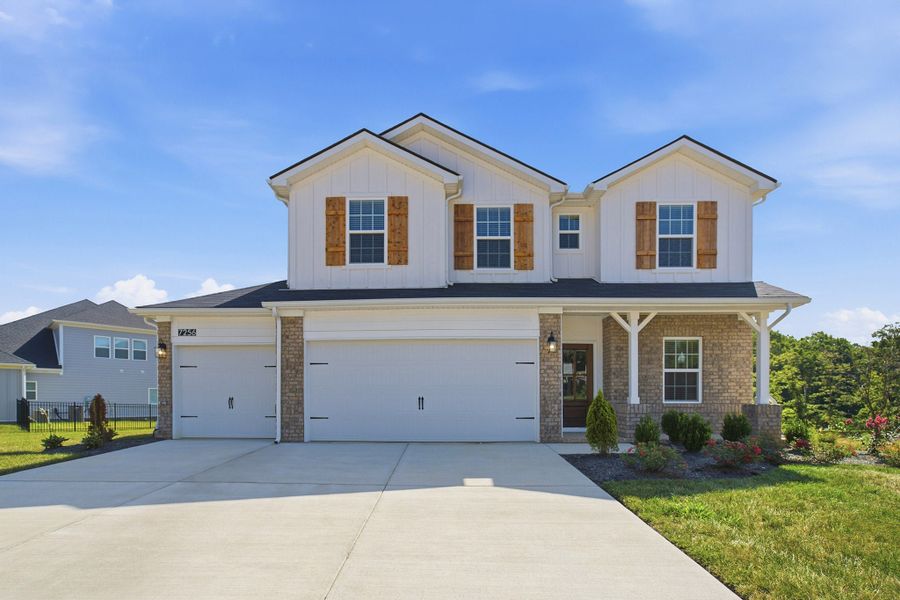 Front exterior of a new home in Brush Creek, Fairview, TN, highlighting curb appeal (Image 27). Front exterior of a new home in Brush Creek, Fairview, TN, highlighting curb appeal (Image 27).