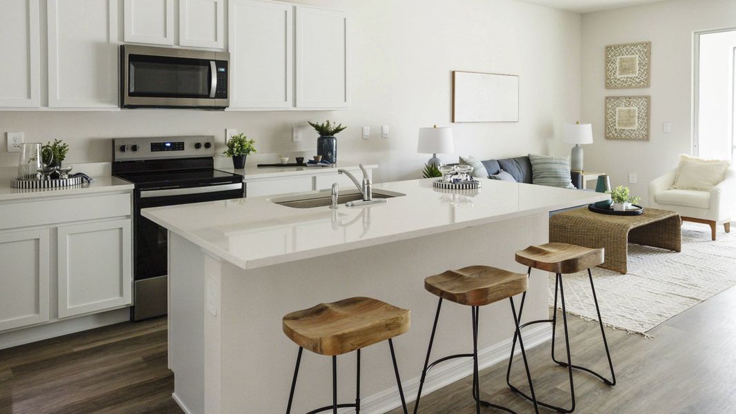 Furnished interior view inside a new home in Oasis at Longwood Run, Sarasota (Image 9).
