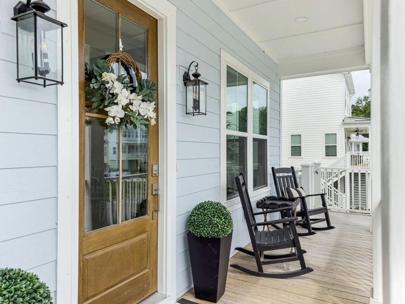 Exterior details and patio area of a home in Overlook at Copahee Sound, Awendaw (Image 25).