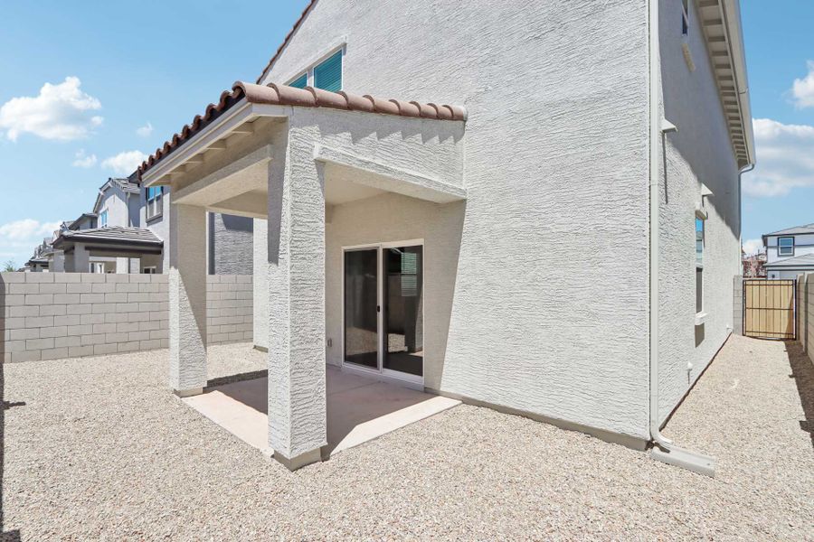 A white building with a door.