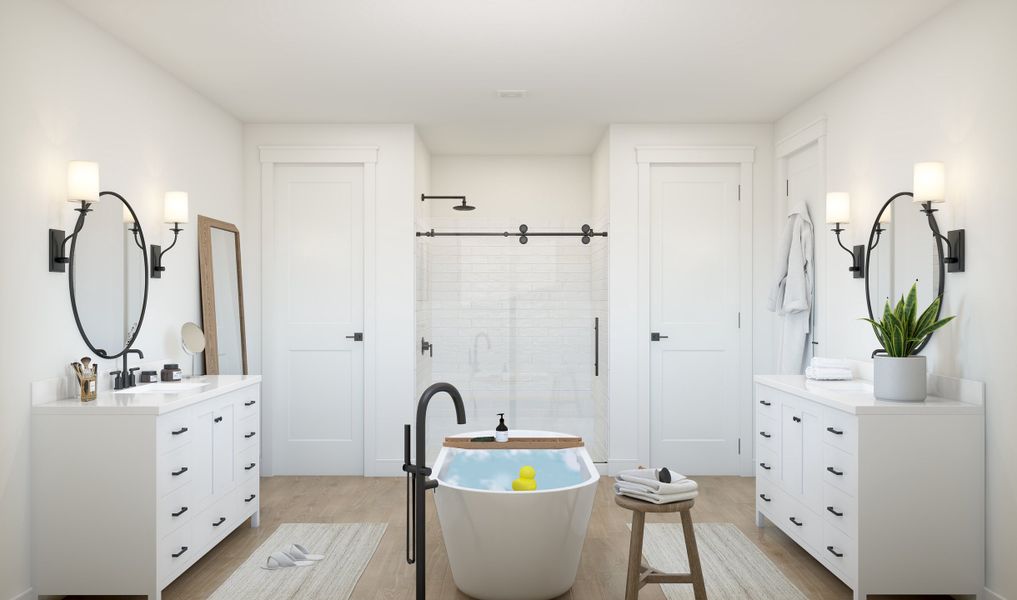 Primary bath with dual freestanding vanities