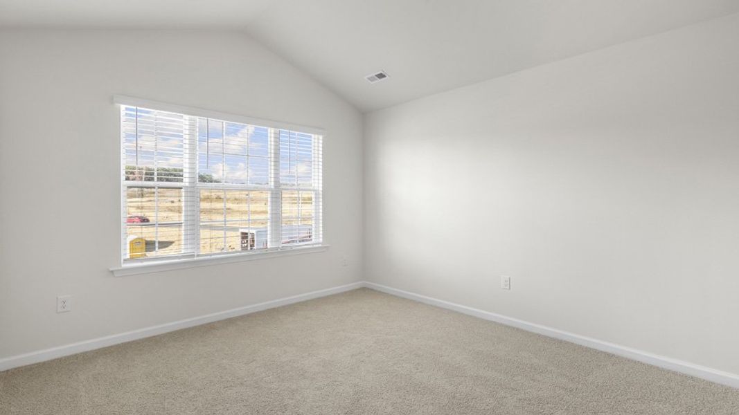 Spacious, unfurnished interior of a new home in The Townes at Galvins Ridge, Sanford (Image 26).