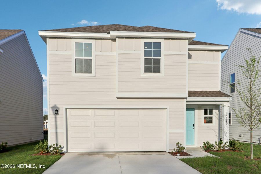 Front exterior of a new home in Park Grove, Jacksonville, FL, highlighting curb appeal (Image 18).