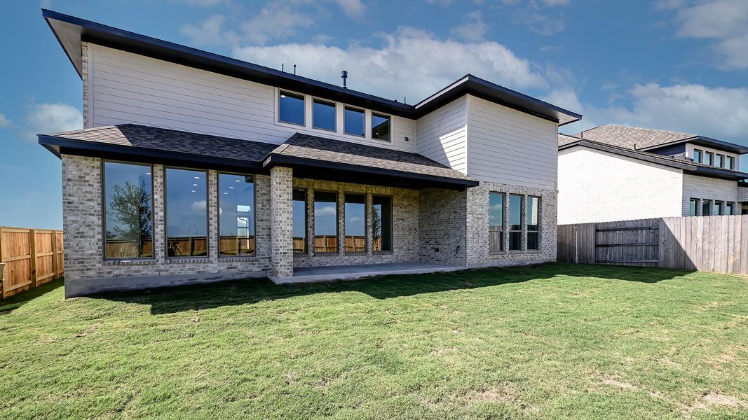 Exterior details and patio area of a home in Crosswinds, Kyle (Image 2).