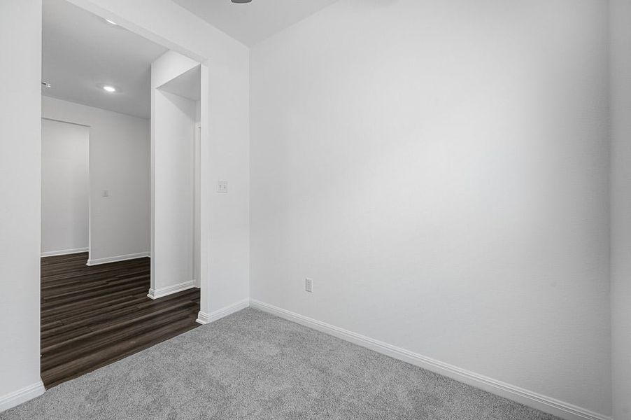 Representative unfurnished interior of a home built from the Mockingbird by Taylor Morrison in Longview 50s, Del Valle (Image 11).
