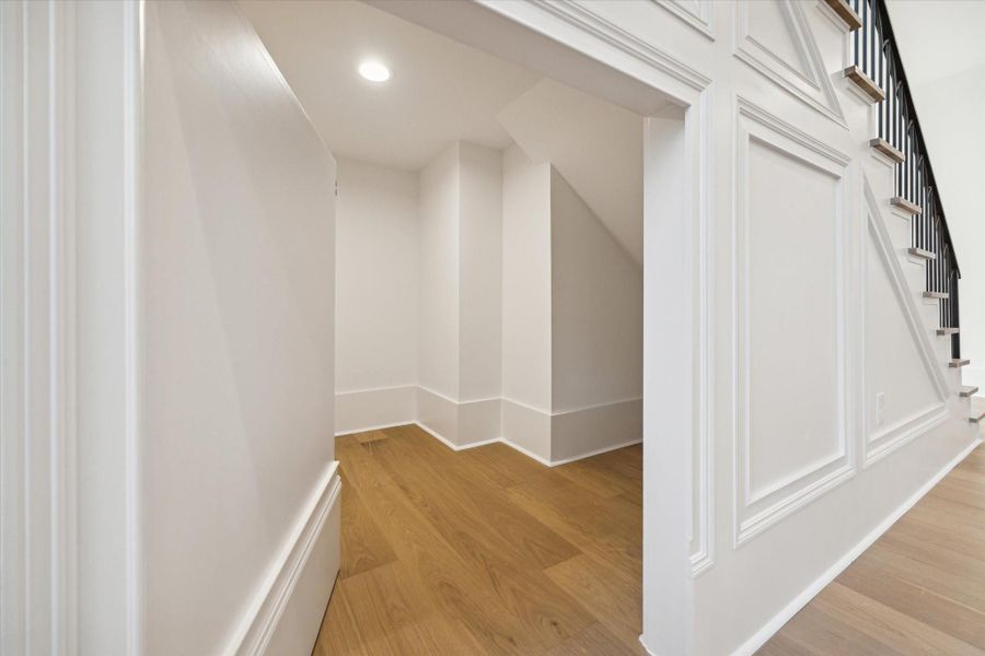 Hidden closet under stairs just one of many bonus features that come with this home!*Picture is of a recently constructed home by the builder.  1519 Candlelight will be similar in quality, but these pictures are not meant to be an exact representation of the new home. Specs of home may change at sole discretion of the seller.