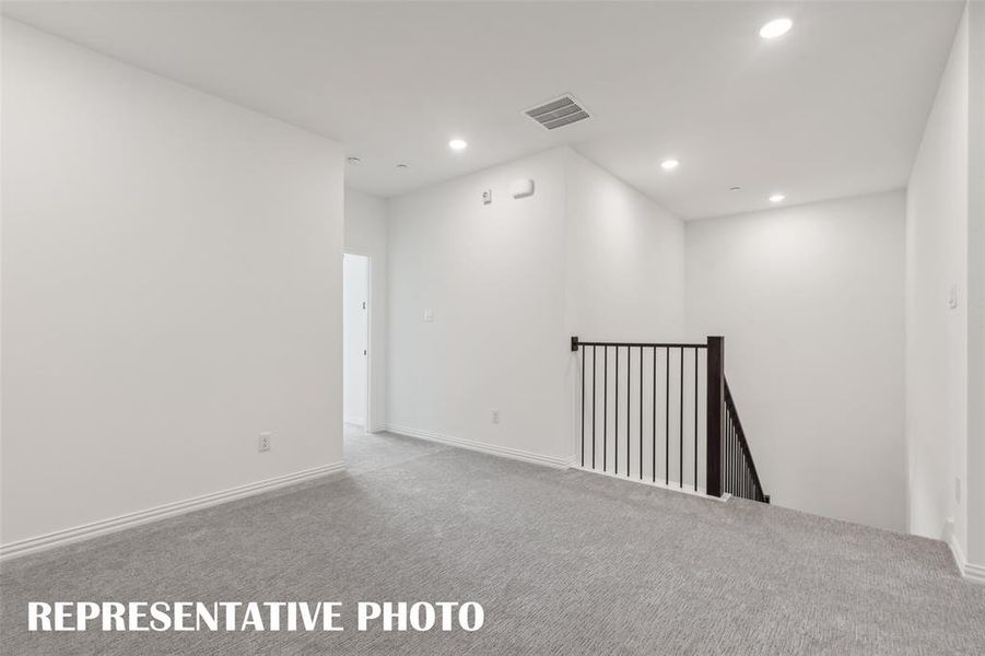 The upstairs game room offers a wonderful second family living area or home office space. REPRESENTATIVE PHOTO The upstairs game room offers a wonderful second family living area or home office space. REPRESENTATIVE PHOTO