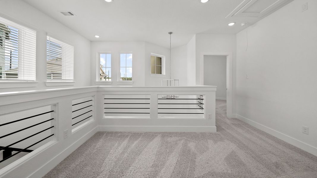 Representative unfurnished interior of a home built from the Rosewood – Courtyard Collection by Chesmar Homes in Jordan Ranch, Pattison (Image 10). Representative unfurnished interior of a home built from the Rosewood – Courtyard Collection by Chesmar Homes in Jordan Ranch, Pattison (Image 10).