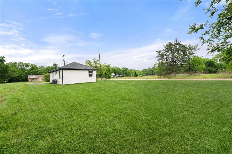 Exterior details and patio area of a home in , Dawson (Image 28).