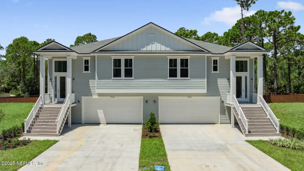Front exterior of a new home in , St. Augustine, FL, highlighting curb appeal (Image 1). Front exterior of a new home in , St. Augustine, FL, highlighting curb appeal (Image 1).