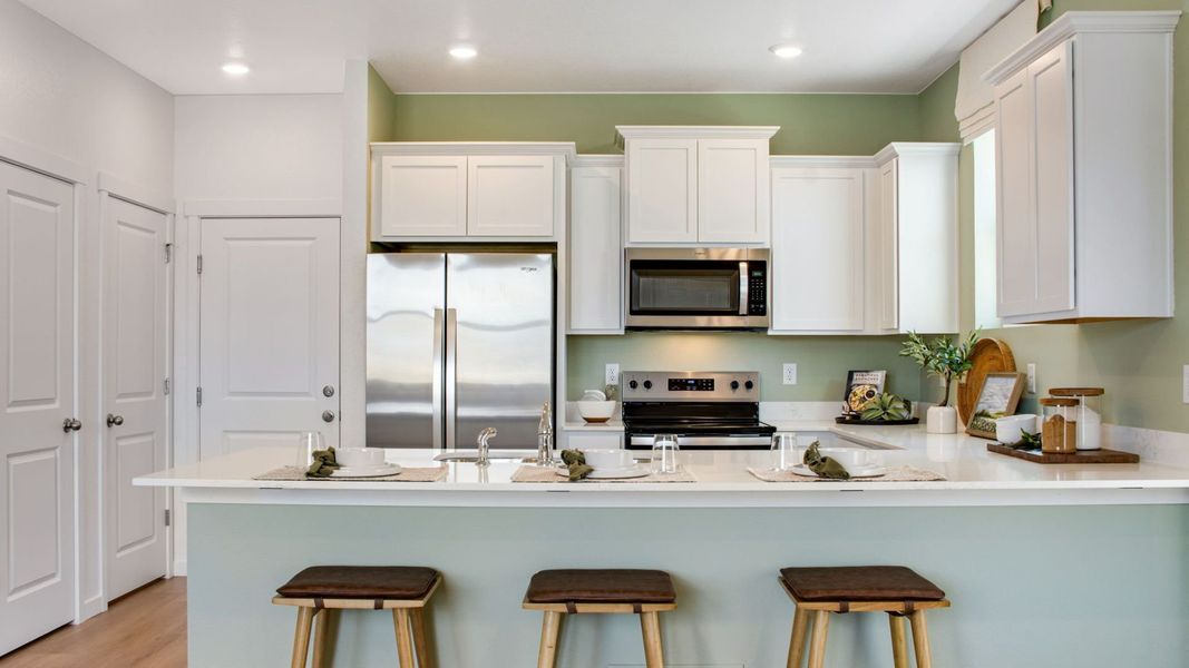 Representative furnished interior of a home built from the NEW HAVEN by D.R. Horton in Tailholt, Severance (Image 11).