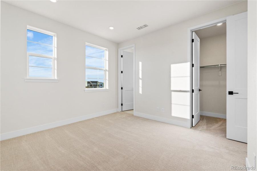 Spacious, unfurnished interior of a new home in Luxe at The Canyons, Castle Pines (Image 34).