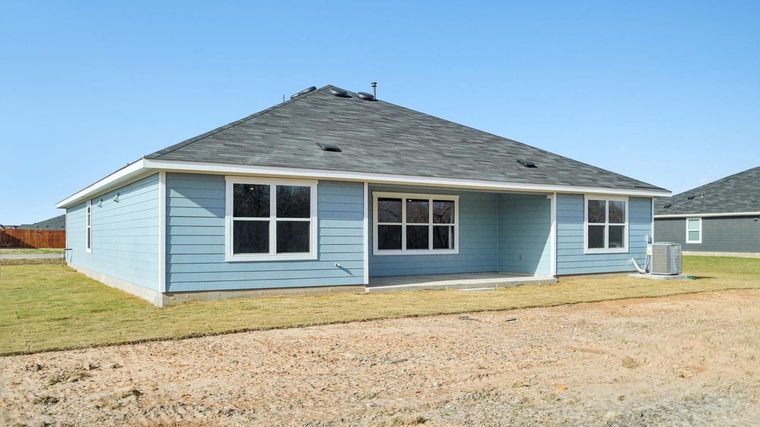 Exterior details and patio area of a home in Railhead, Cedar Creek (Image 15).