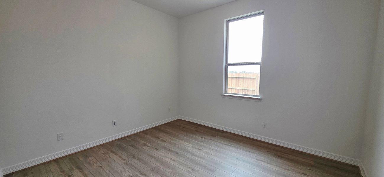 Spacious, unfurnished interior of a new home in Sunterra Lakes, Brookshire (Image 8).