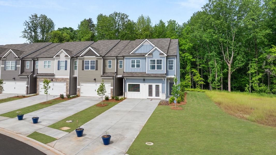 Representative exterior photo of a completed home built from the Sudbury by D.R. Horton in Oconee Overlook Townhomes, Gainesville, GA (Image 2). Representative exterior photo of a completed home built from the Sudbury by D.R. Horton in Oconee Overlook Townhomes, Gainesville, GA (Image 2).