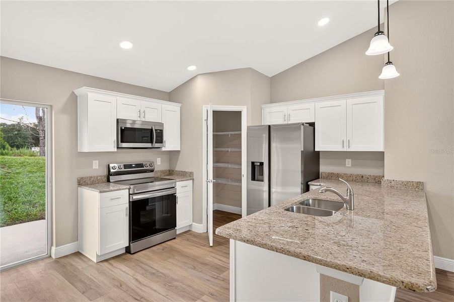 Furnished interior view inside a new home in , Dunnellon (Image 7).