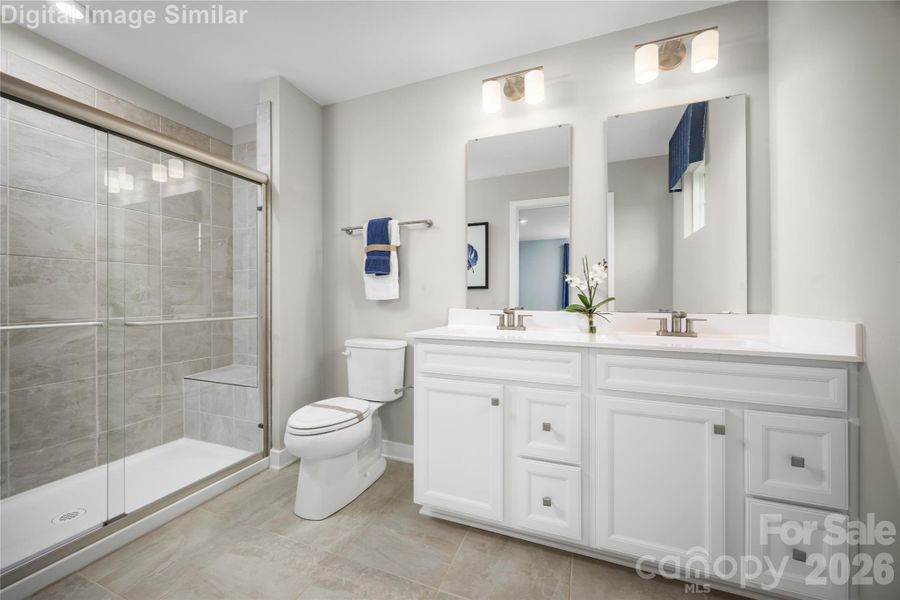 Now this is a bathroom—double vanities, sleek finishes, total comfort.