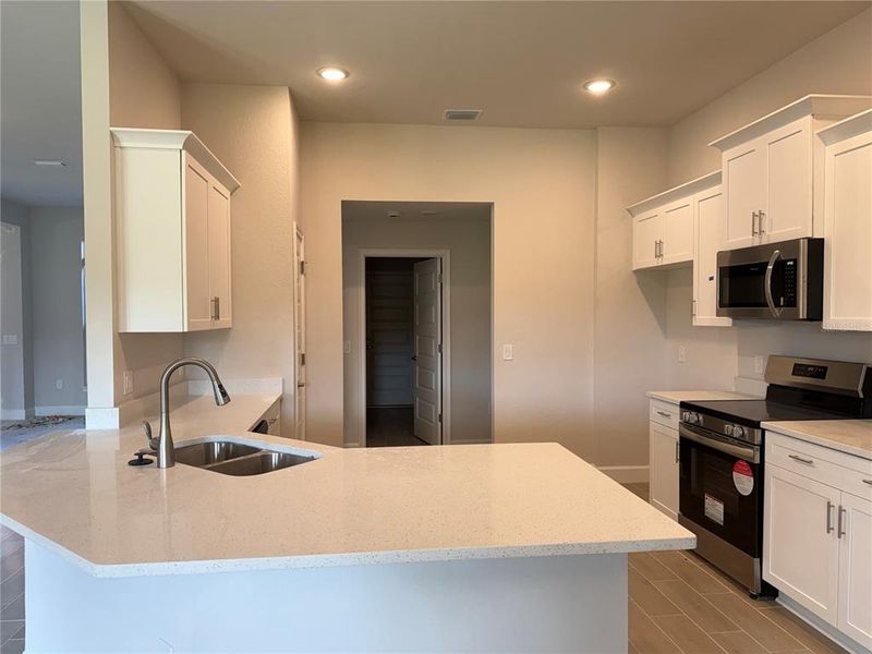 Furnished interior view inside a new home in , Port Charlotte (Image 10).