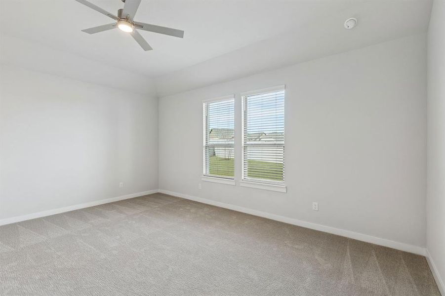 Bedroom in the Stanley II home plan by Trophy Signature Homes – REPRESENTATIVE PHOTO