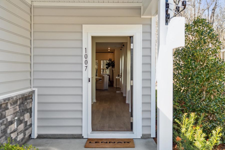 Exterior details and patio area of a home in Horizons at Summers Corner | 55+, Summerville (Image 27).