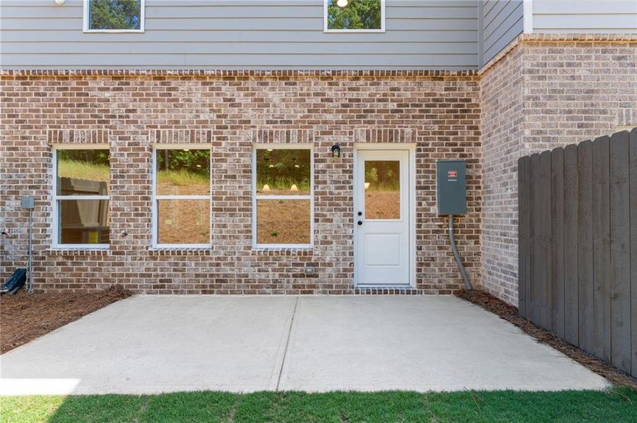 Exterior details and patio area of a home in Wildwood Place, Powder Springs (Image 3).
