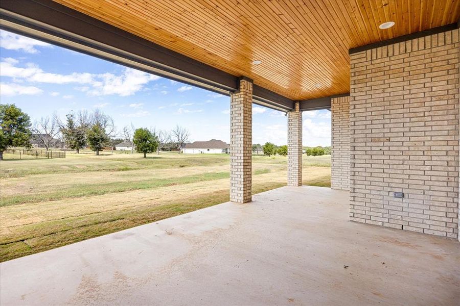 Exterior details and patio area of a home in Pecan Plantation, Granbury (Image 28).